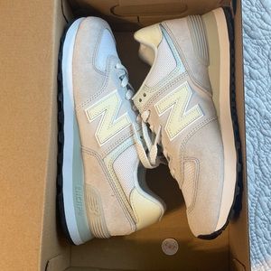 Women’s new balance shoes, never worn and still in box. Size 8